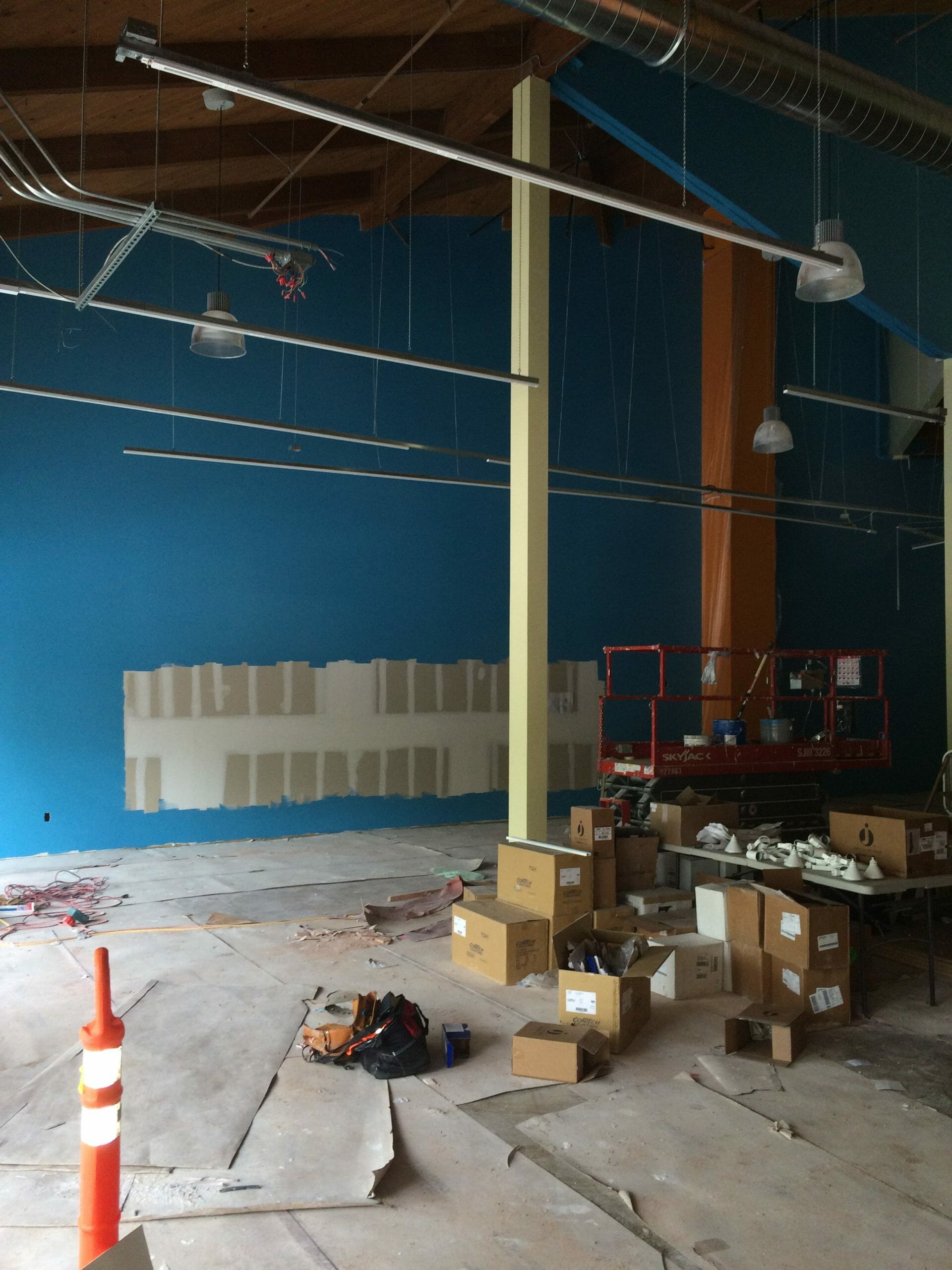 Scissor lift with paint supplies on it