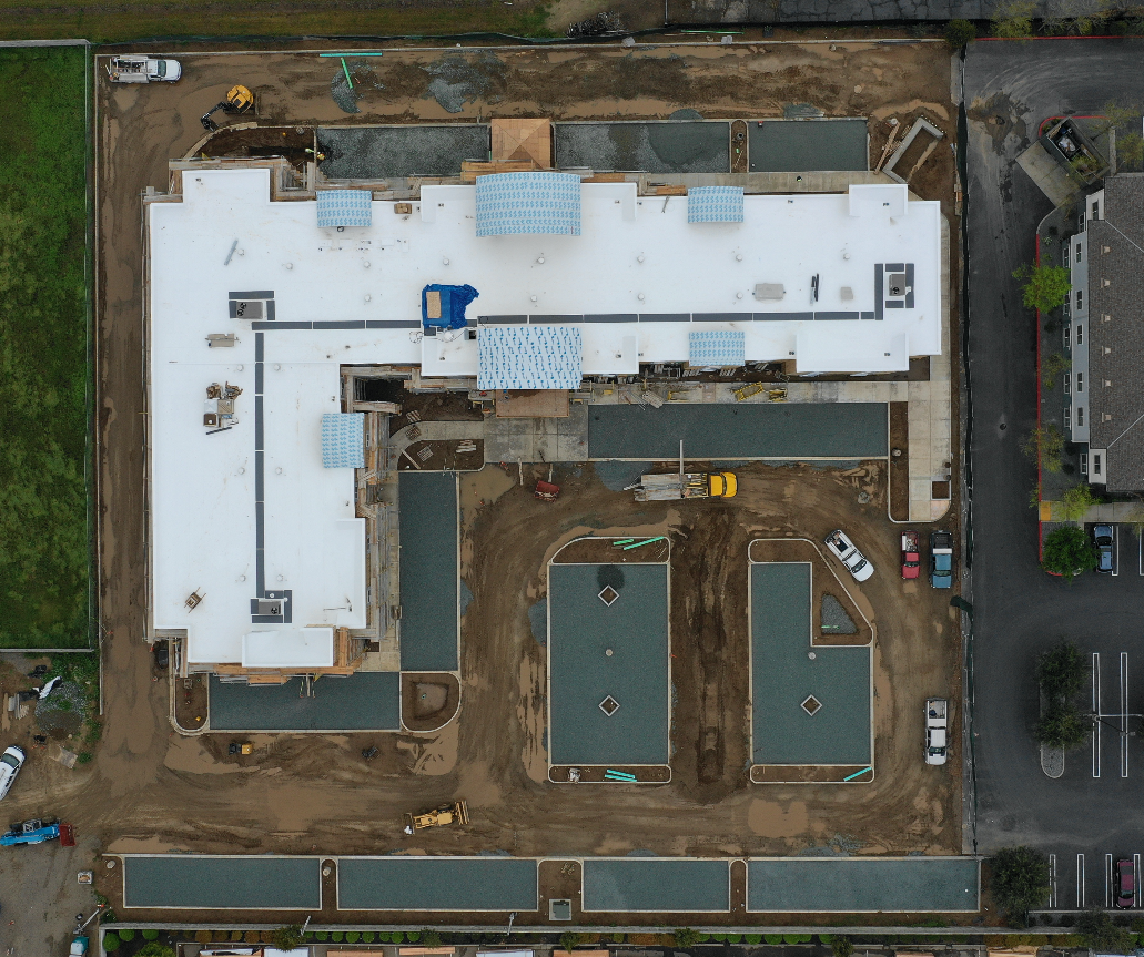 aerial view of project in progress 90 degrees above roofing finished