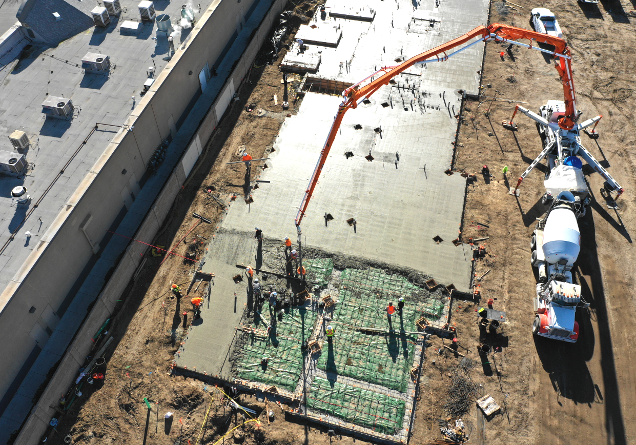 drone view of concrete pour workers