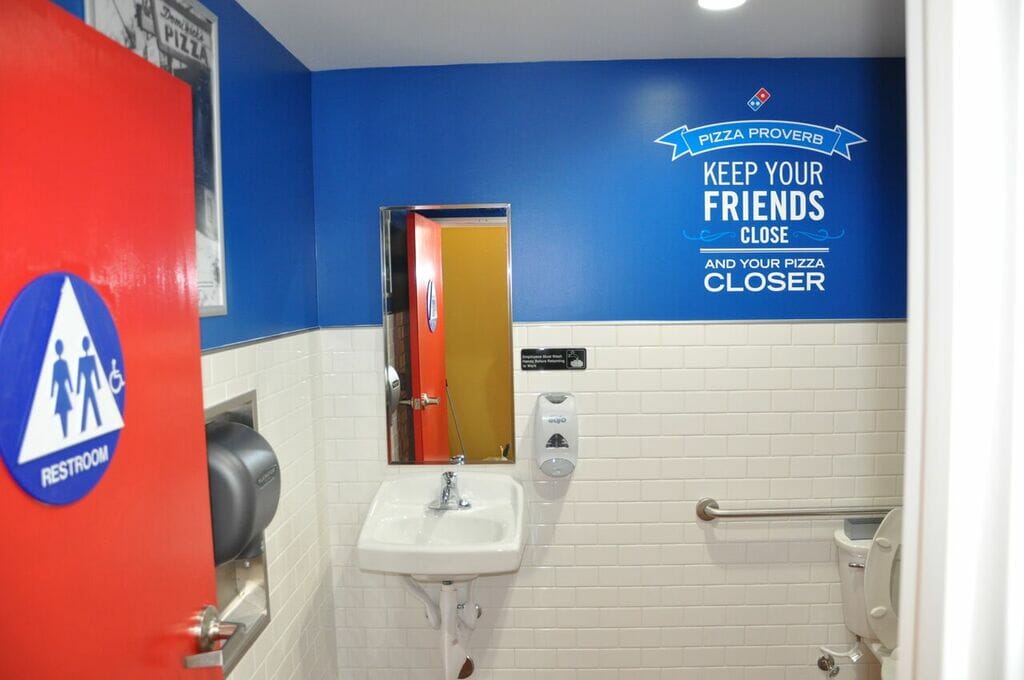 Domino's bathroom blue wall